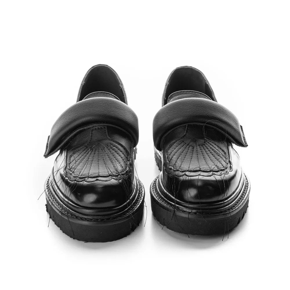 In the Spotlight black leather shoes