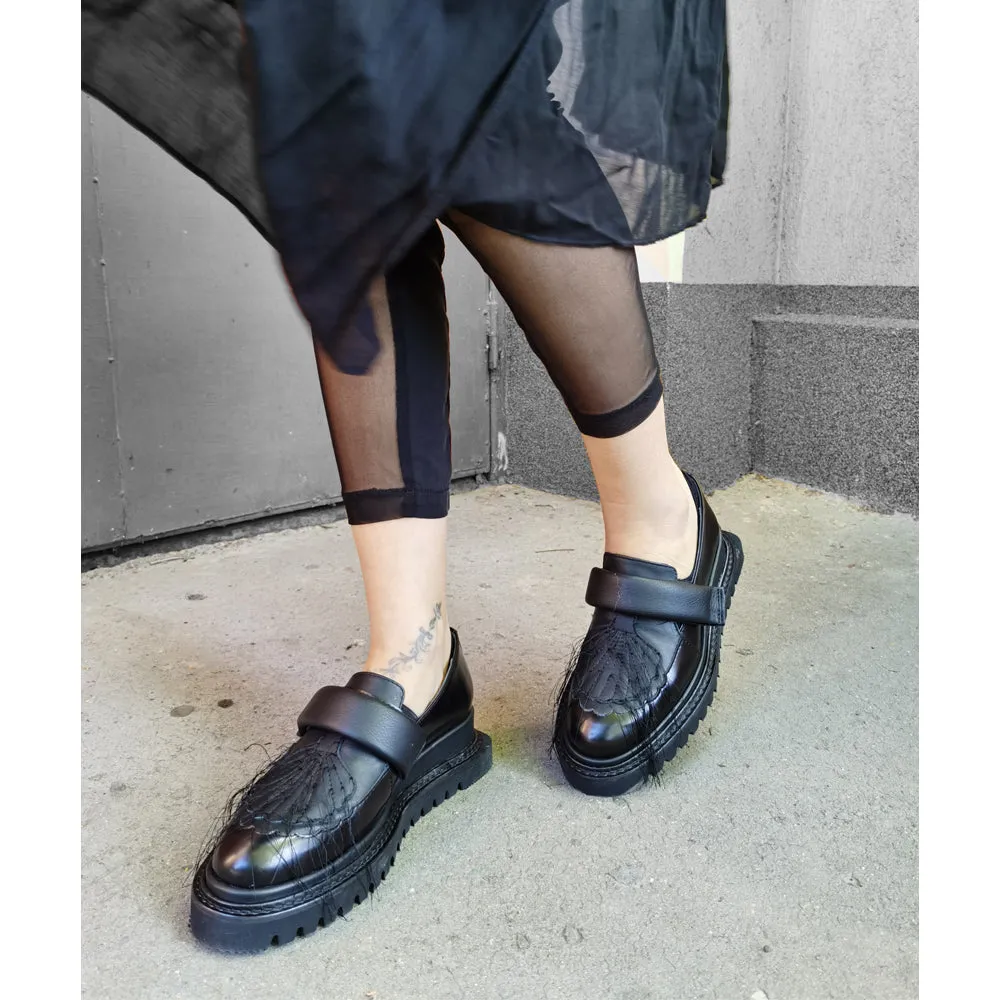In the Spotlight black leather shoes